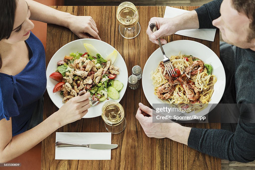 Couple having lunch at cafe