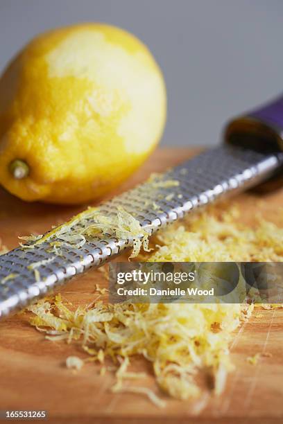 close up of grated lemon peel - scorza di limone foto e immagini stock