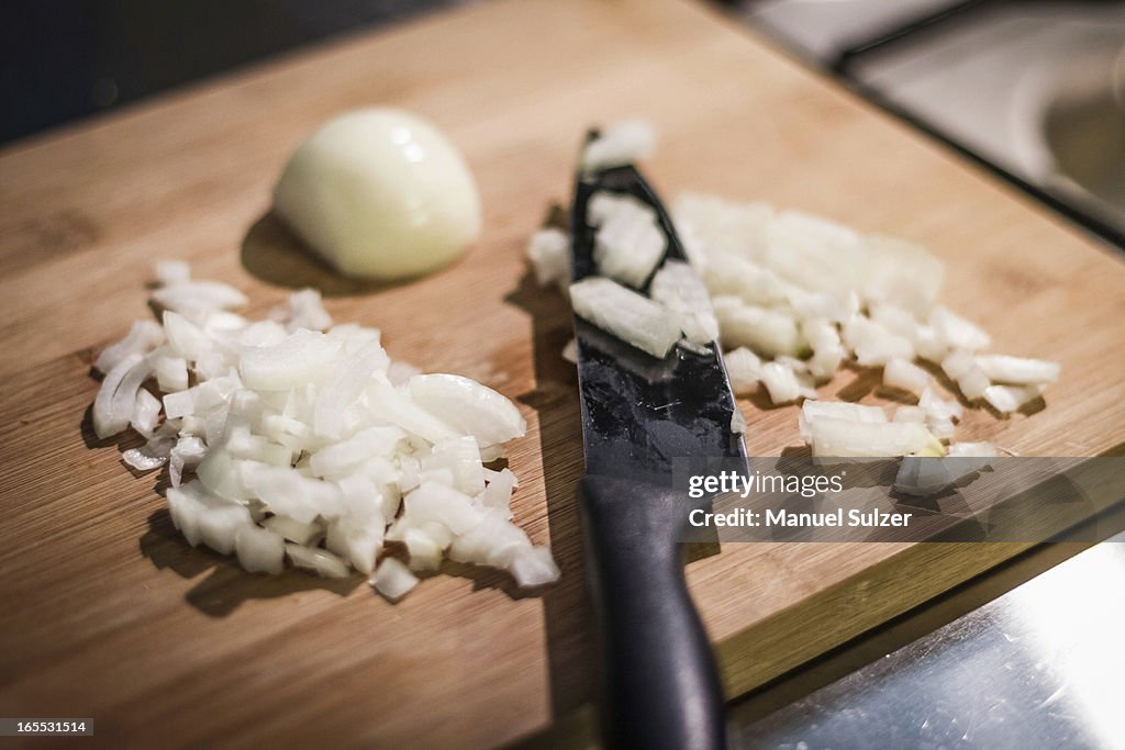 Chopped onions on cutting board