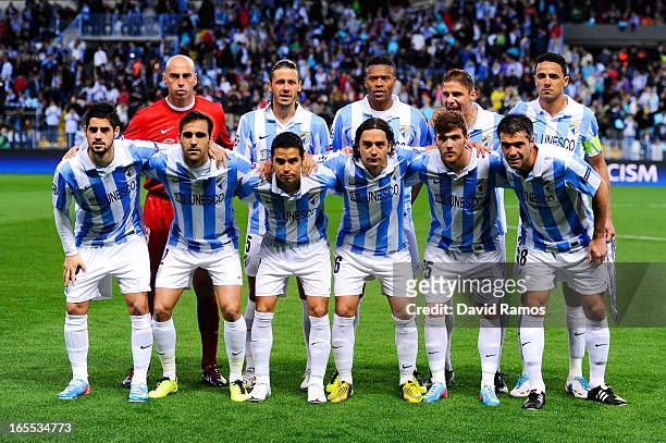 Malaga CF players pose prior to the UEFA Champions League quarter-final first leg match between Malaga CF and Borussia Dortmund at La Rosaleda...