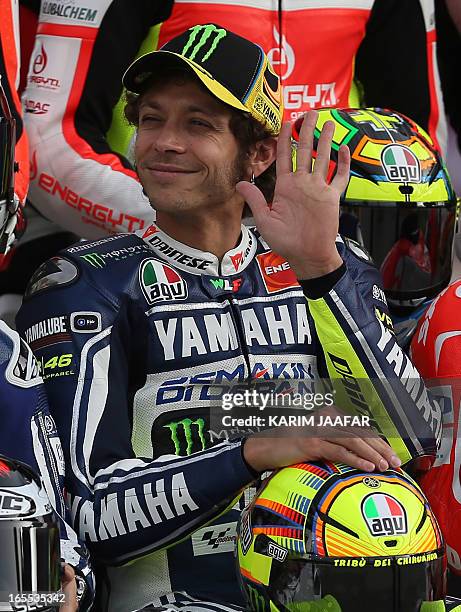 Yamaha MotoGP rider Valentino Rossi of Italy poses for a picture at the International Circuit in the Qatari capital Doha on April 4 during the Qatar...