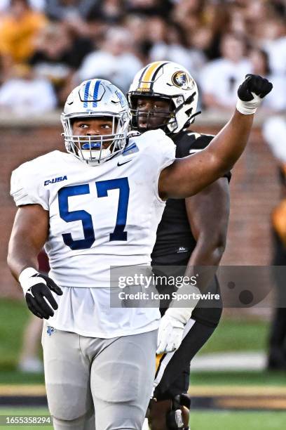 Middle Tennessee Blue Raiders defensive tackle Marley Cook celebrates getting a tackle for a loss during a college football game between the Middle...