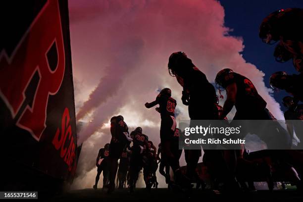 The Rutgers Scarlet Knights takes the field before a game against the Temple Owls at SHI Stadium on September 9, 2023 in Piscataway, New Jersey.