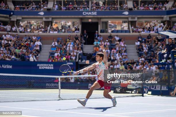 September 2: Carlos Alcaraz of Spain plays a winner at the net during his match against Daniel Evans of Great Britain in the Men's Singles round...