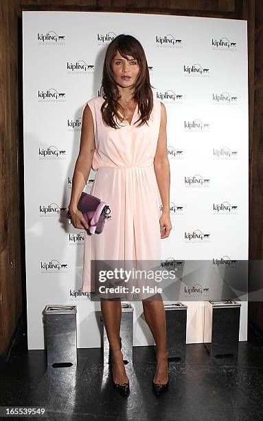 Helena Christensen attends the launch of new hangbag collection 'Kipling x Helena Christensen' at Beach Blanket Babylon on April 4, 2013 in London,...