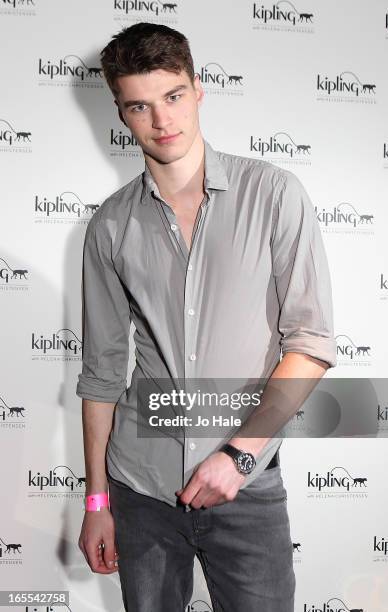 Aaron Sly model attends the launch of new hangbag collection 'Kipling x Helena Christensen' at Beach Blanket Babylon on April 4, 2013 in London,...