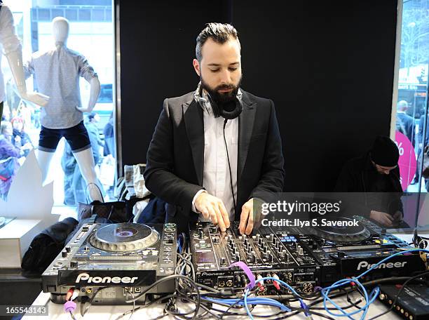 Mike Nouveau performs at H&M's Conscious Collection Launch Event at H&M Fifth Avenue on April 4, 2013 in New York City.