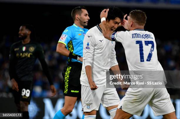 Daichi Kamada of SS Lazio celebrates a second goal with his teammates during the Serie A TIM match between SSC Napoli and SS Lazio at Stadio Diego...