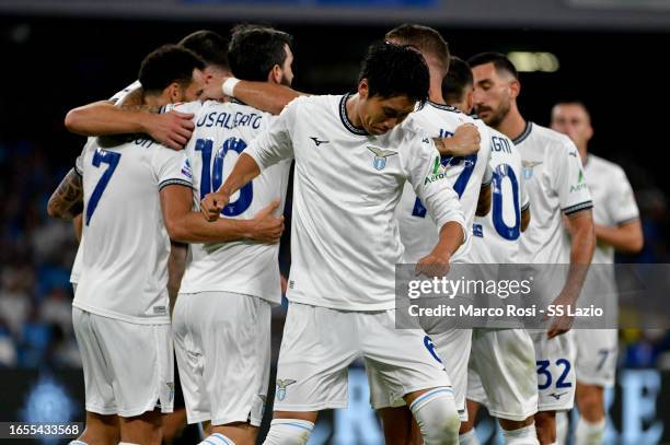 Daichi Kamada of SS Lazio celebrates a second goal with his teammates during the Serie A TIM match between SSC Napoli and SS Lazio at Stadio Diego...