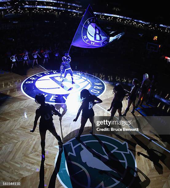 The Brooklyn Knight and the Brooklynettes get the crowd going at the start of the game between the Brooklyn Nets and the Chicago Bulls at the...