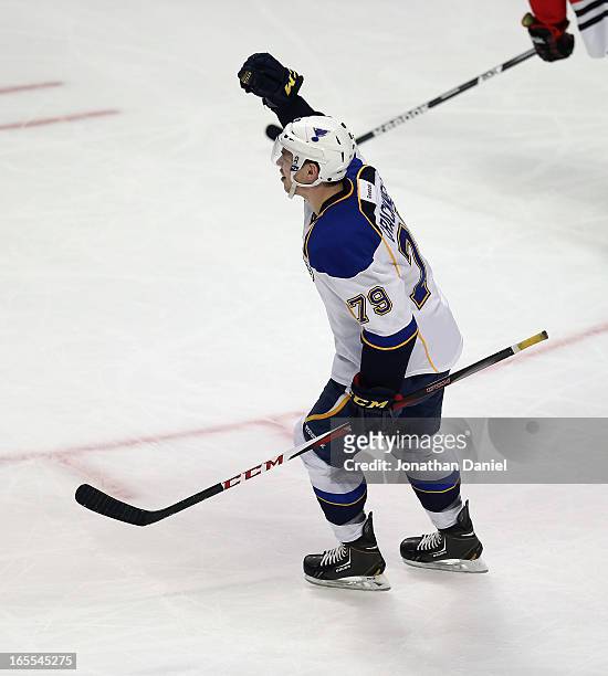 Adam Cracknell of the St. Louis Blues celebrates his first period goal against the Chicago Blackhawks at the United Center on April 4, 2013 in...
