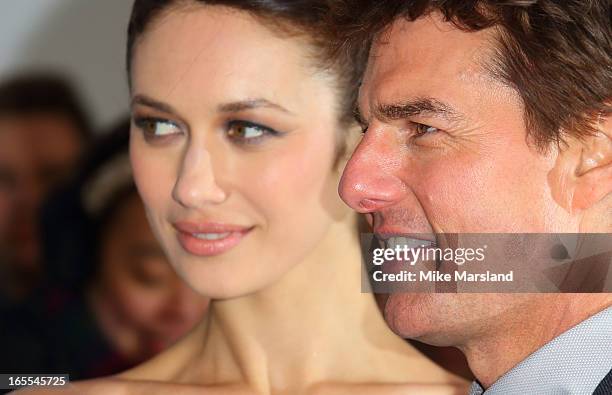 Olga Kurylenko and Tom Cruise attend the UK Premiere of 'Oblivion' at BFI IMAX on April 4, 2013 in London, England.