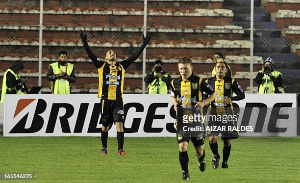 Ernesto Cristaldo of Bolivia's The Strongest celebrates with teammates after scoring against Brazil's Sao Paulo, during their Libertadores Cup match...