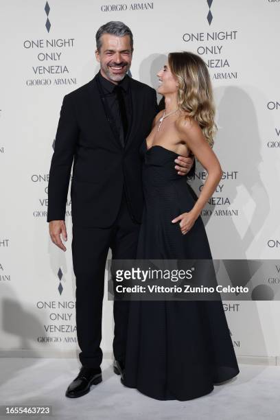 Luca Argentero and Cristina Marino attend Giorgio Armani "One Night In Venice" photocall on September 02, 2023 in Venice, Italy.