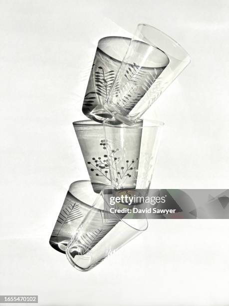 three juice glasses. - empty glasses after party stock-fotos und bilder
