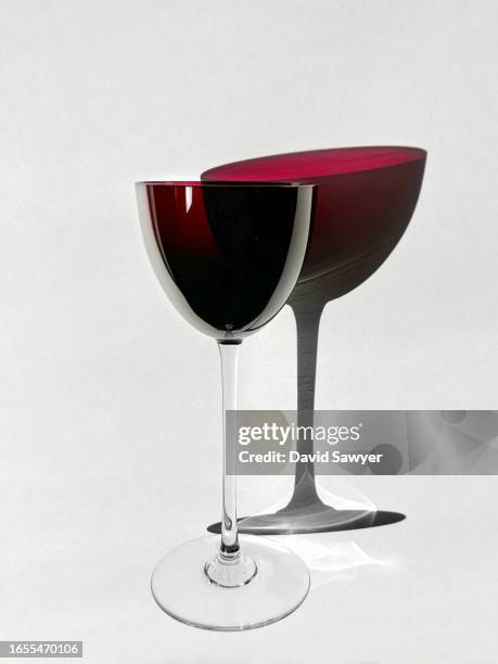 red colored wine glass - empty glasses after party stock pictures, royalty-free photos & images
