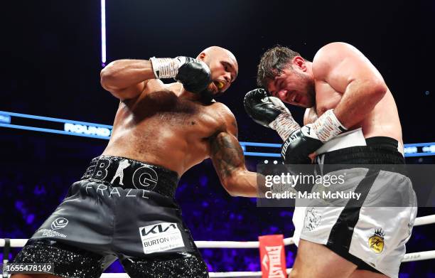 Frazer Clarke punches David Allen during his Heavyweight Contest fight at Manchester Arena on September 02, 2023 in Manchester, England.