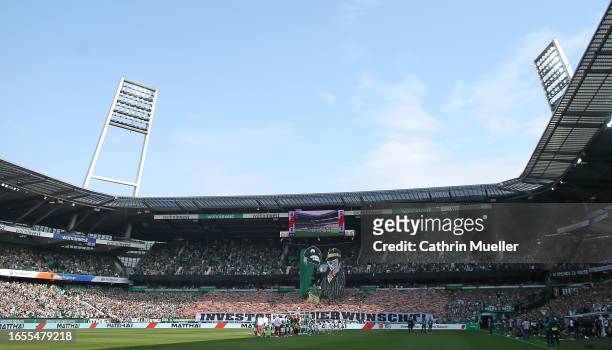 Supporters of Werder Bremen showing a Choreographie against Investors during the Bundesliga match between SV Werder Bremen and 1. FSV Mainz 05 at...
