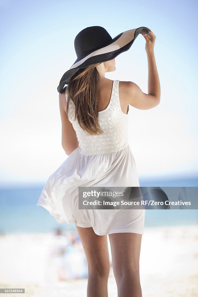 Woman walking on beach