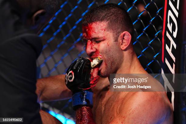 Thiago Moises of Brazil reacts after being defeated by Benoit Saint Denis of France in a lightweight fight during the UFC Fight Night event at The...