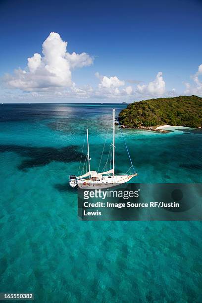 sailboat in tropical water - saint vincent grenadines stock pictures, royalty-free photos & images