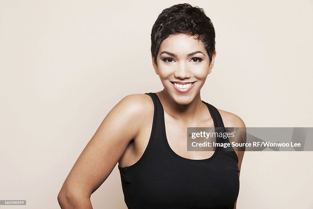 Smiling woman standing indoors