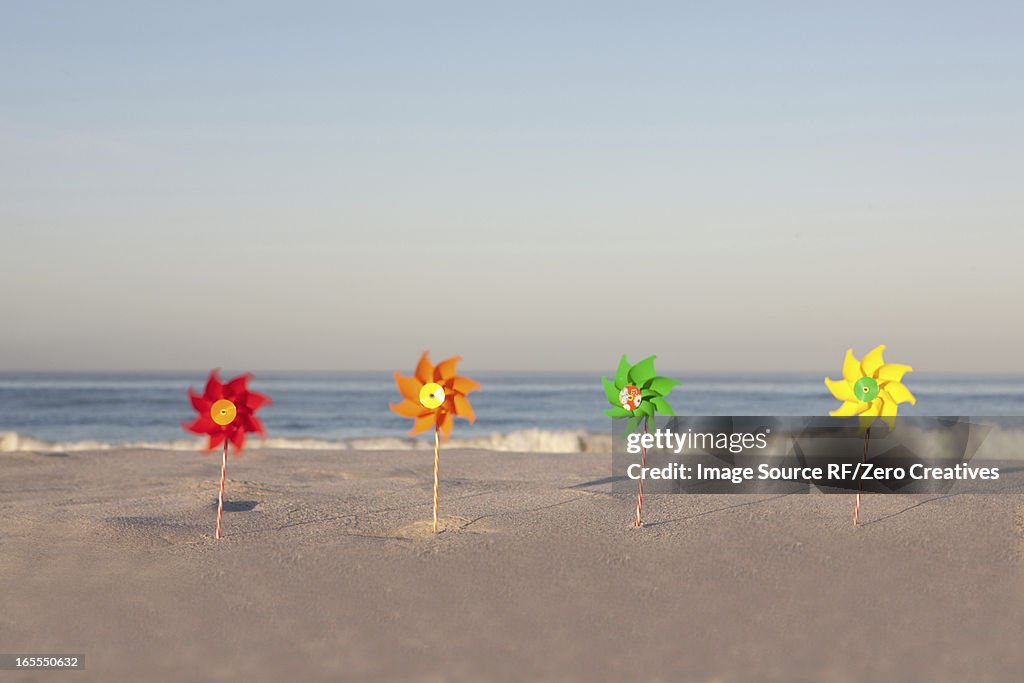 Pinwheels on empty beach