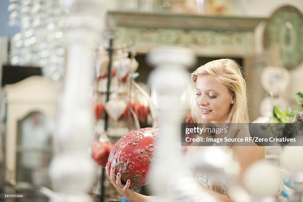 Smiling woman shopping in store