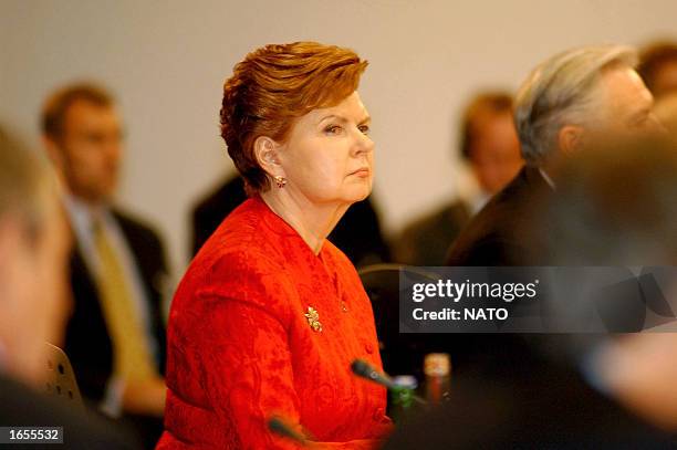 Latvian President Vaira Vike-Freiberga listens during a North Atlantic Council Meeting at the level of Heads of State and Government November 20,...