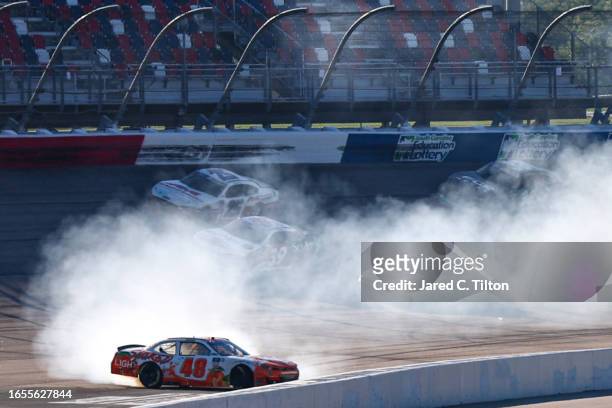 Parker Kligerman, driver of the Spiked Light Coolers Chevrolet, spins after an on-track incident during the NASCAR Xfinity Series Sport Clips...