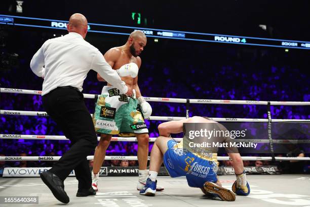 Chris Eubank Jr knocks down Liam Smith during the Chris Eubank Jr v Liam Smith II Middleweight Title fight at Manchester Arena on September 02, 2023...