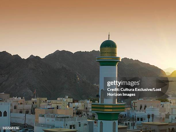 mountains and muscat skyline - oman skyline stock-fotos und bilder