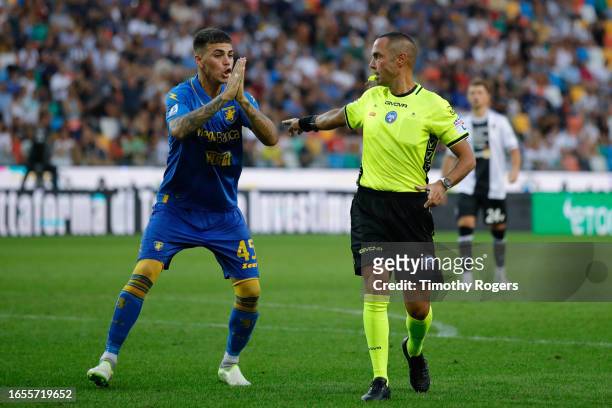 Enzo Barrenechea of Frosinone reacts as referee Marco Guida awards a penalty to Udinese during the Serie A TIM match between Udinese Calcio and...