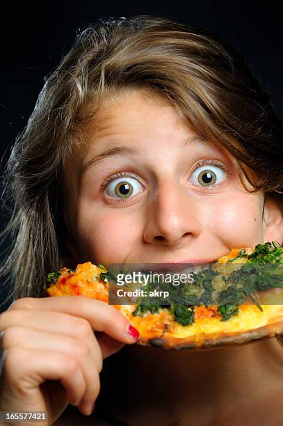 ragazza mangiare una pizza - caucasian 11 12 girl portrait vertical beautiful foto e immagini stock