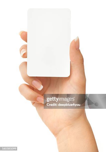 blank play card in woman hand on white - woman holding up card stock pictures, royalty-free photos & images