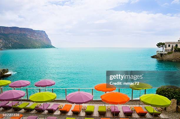 beach with parasol in cassis, france - coastline cannes stock pictures, royalty-free photos & images