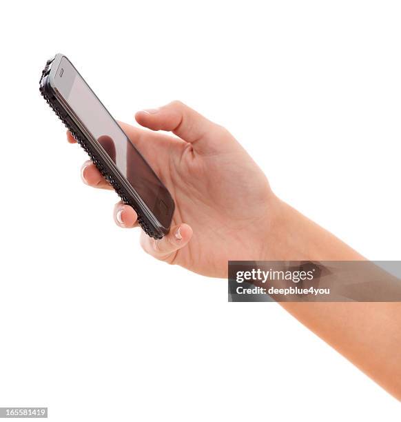 smartphone de femme main sur blanc - pouce fond blanc photos et images de collection