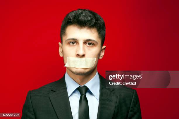 shut up! - taped mouth - gagged stock pictures, royalty-free photos & images