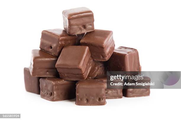 chocolate cubes - chocolate shaving stock pictures, royalty-free photos & images