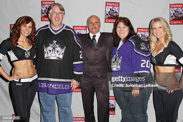 Daryl Evans and The LA Kings Ice Crew pose with guests at the LA Kings Chalk Talk & Game Experience at Staples Center on April 4, 2013 in Los...