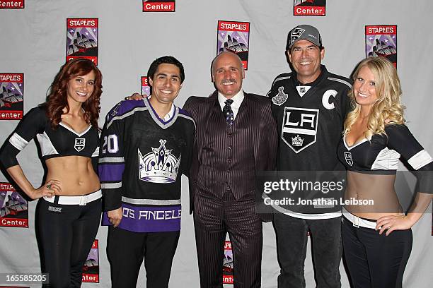 Daryl Evans and The LA Kings Ice Crew pose with guests at the LA Kings Chalk Talk & Game Experience at Staples Center on April 4, 2013 in Los...