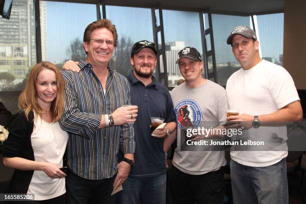 Kings fans pose at the LA Kings Chalk Talk & Game Experience at Staples Center on April 4, 2013 in Los Angeles, California.