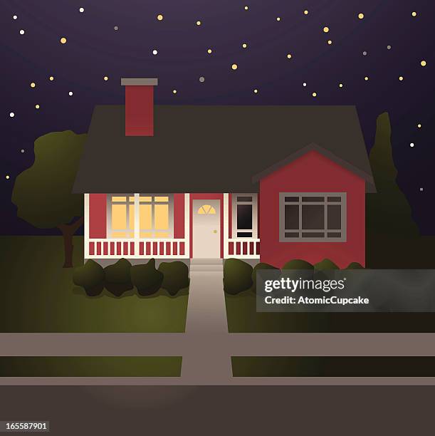 red house with covered porch at night - curb appeal night stock illustrations