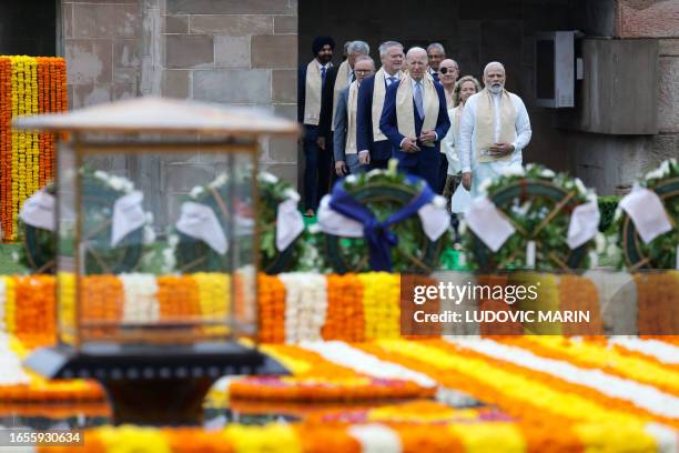 India's Prime Minister Narendra Modi , US President Joe Biden , German Chancellor Olaf Scholz and Australia's Prime Minister Anthony Albanese along...