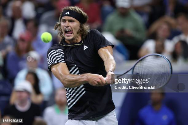 Alexander Zverev of Germany returns a shot against Grigor Dimitrov of Bulgaria during their Men's Singles Third Round match on Day Six of the 2023 US...