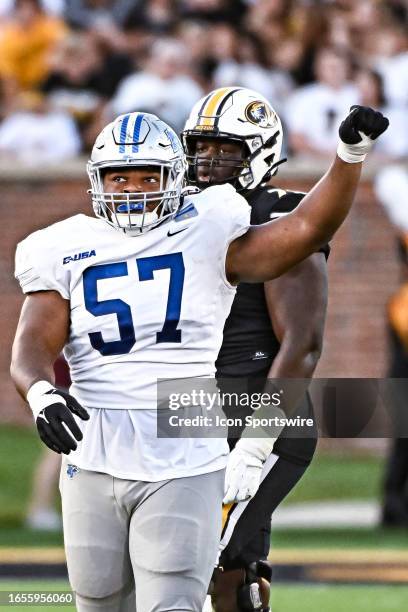 Middle Tennessee Blue Raiders defensive tackle Marley Cook celebrates getting a tackle for a loss during a college football game between the Middle...