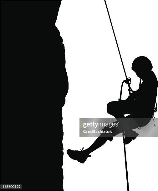 descending on rope - abseiling stock illustrations