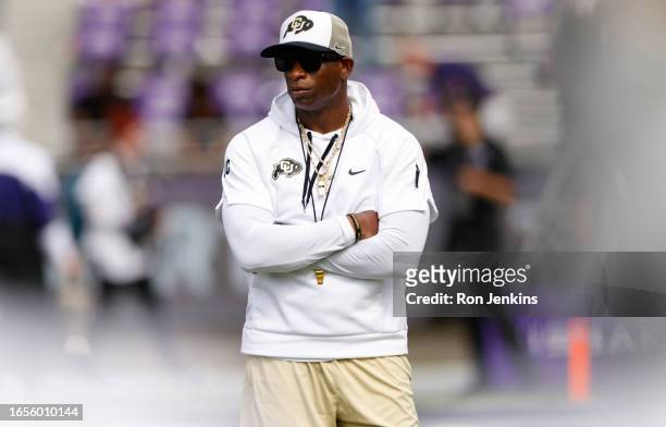 Head coach Deion Sanders of the Colorado Buffaloes walks the field before the game between the TCU Horned Frogs and the Colorado Buffaloes at Amon G....