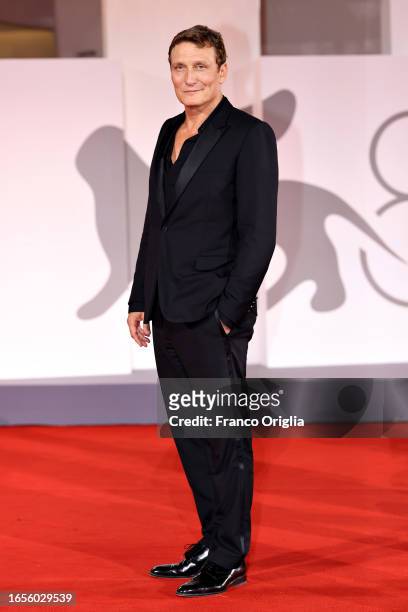 Oliver Masucci attends a red carpet for the Campari Passion For Film Award Ceremony & "The Palace" at the 80th Venice International Film Festival on...