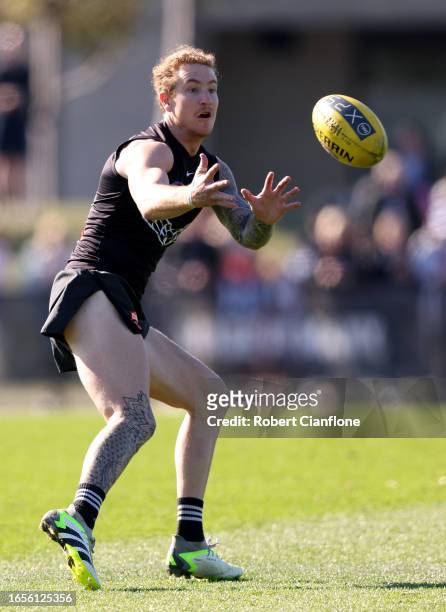 Beau McCreery of the Magpies takes the ball during a Collingwood Magpies training and media session at AIA Vitality Centre on September 03, 2023 in...
